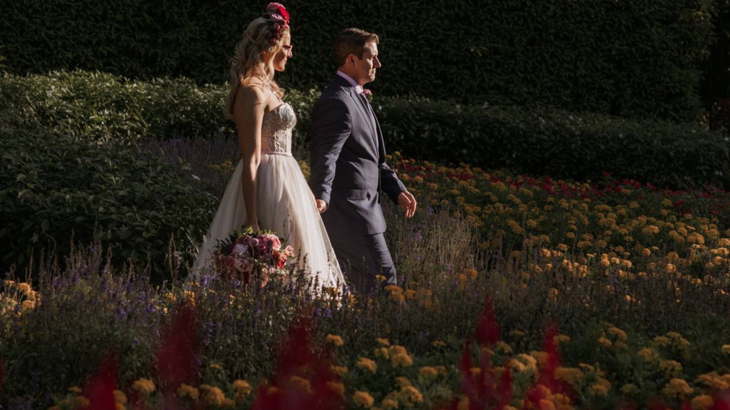 wedding-couple-walking-in-garden-brisbane-cbd