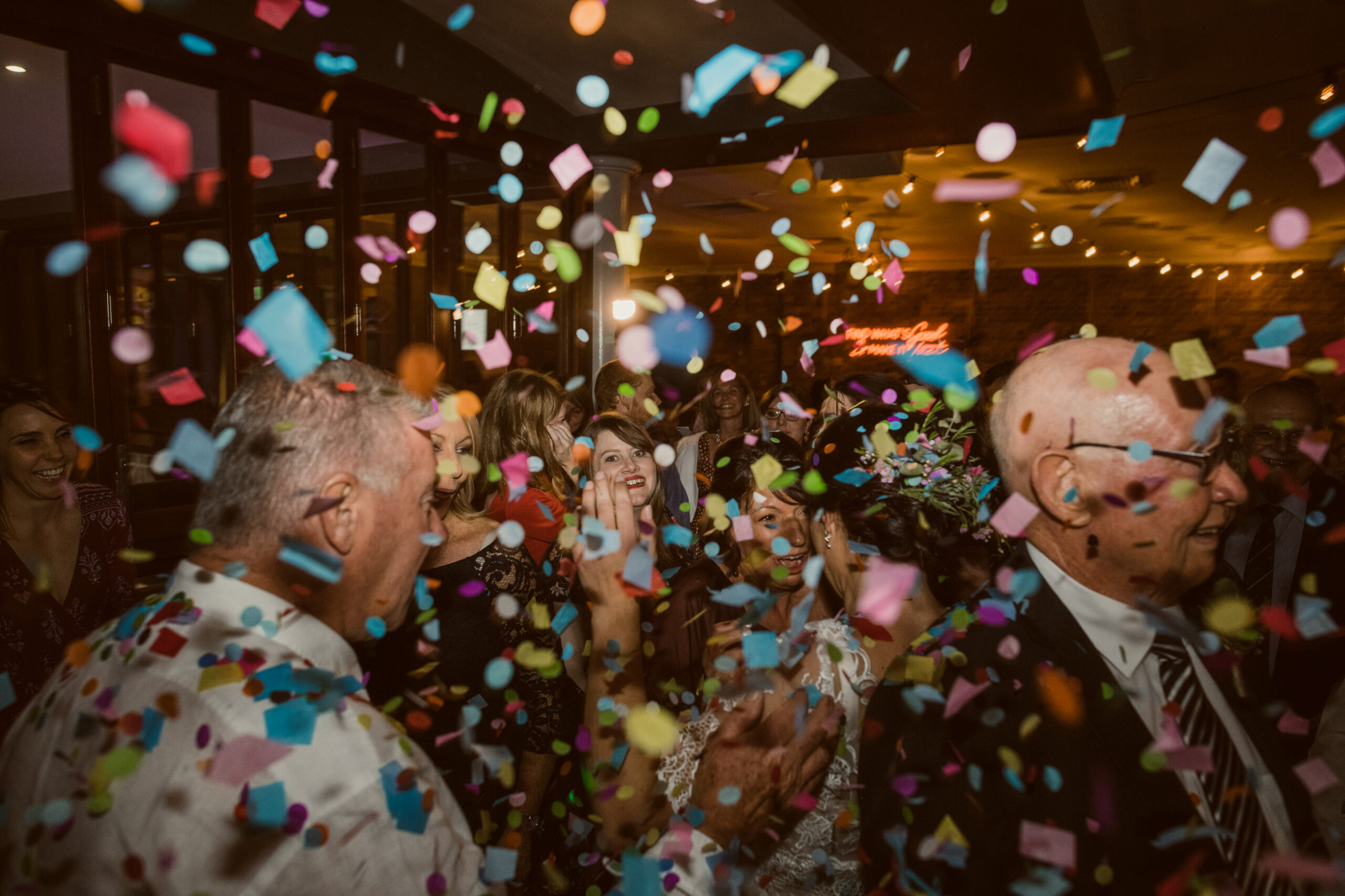 edding guests celebrating together on a lively evening dance floor