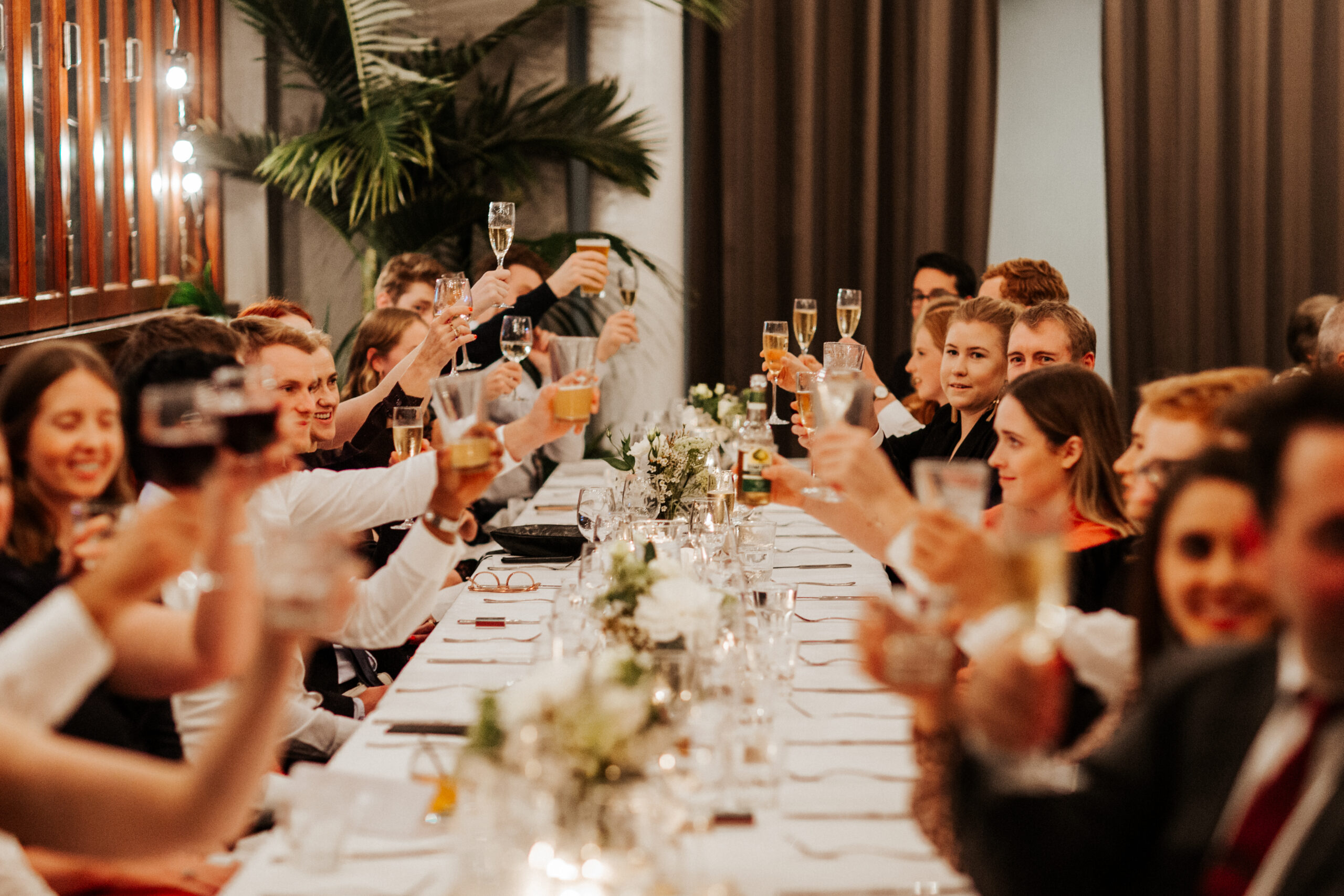 Long reception table prepared for a formal wedding dinner in Brisbane