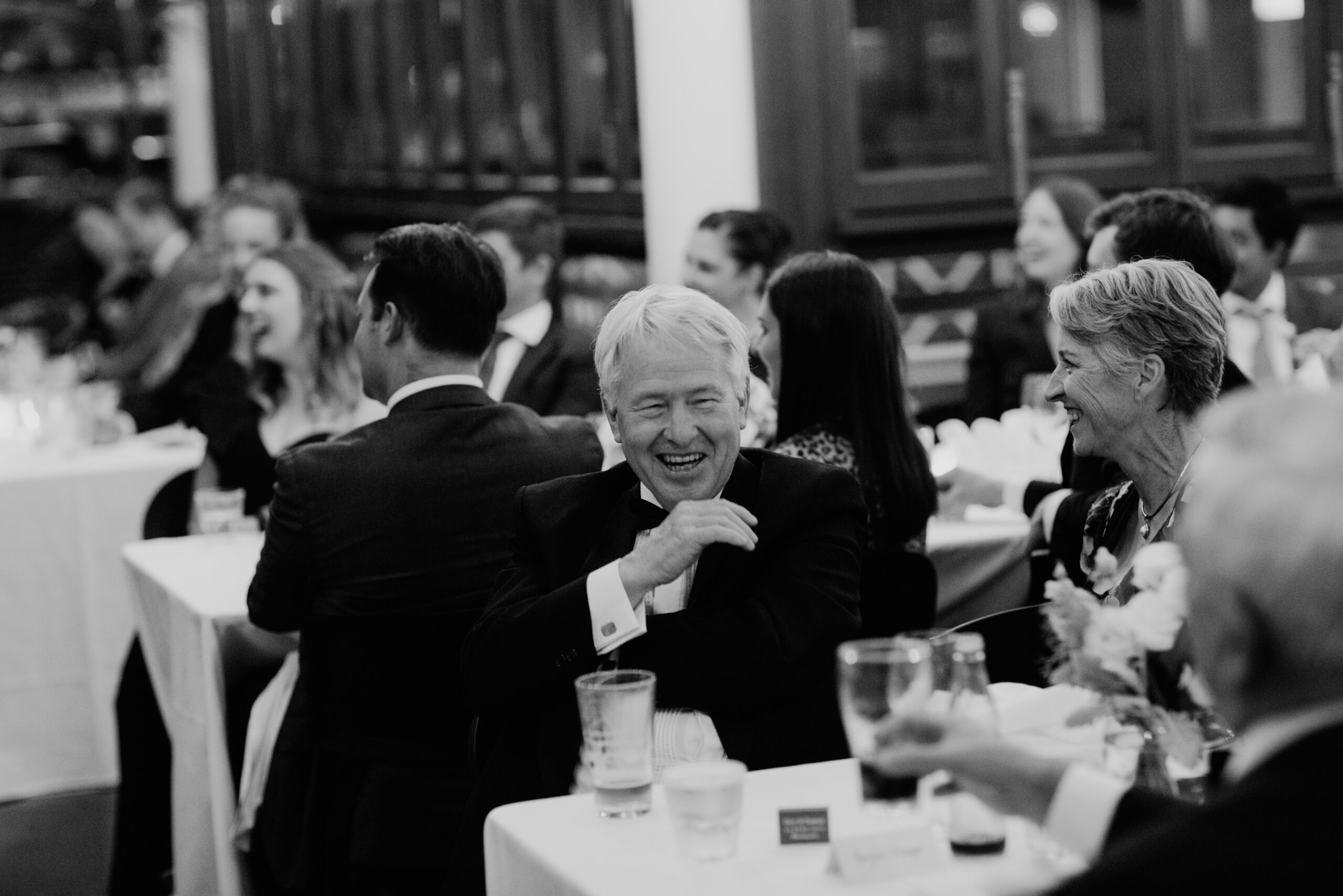 Wedding speech delivered while guests are seated for dinner service