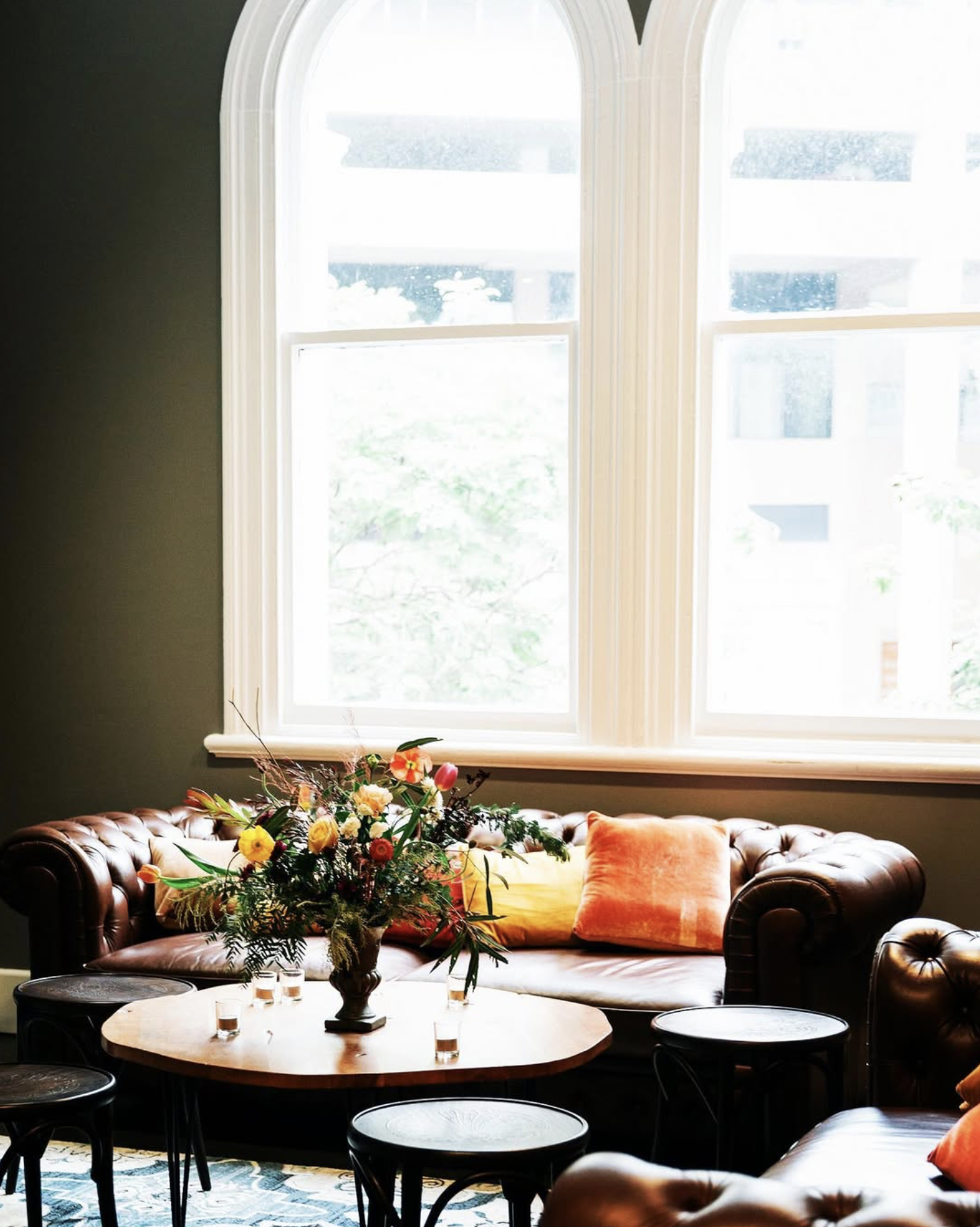 Comfortable seating nook prepared for family members during a wedding celebration