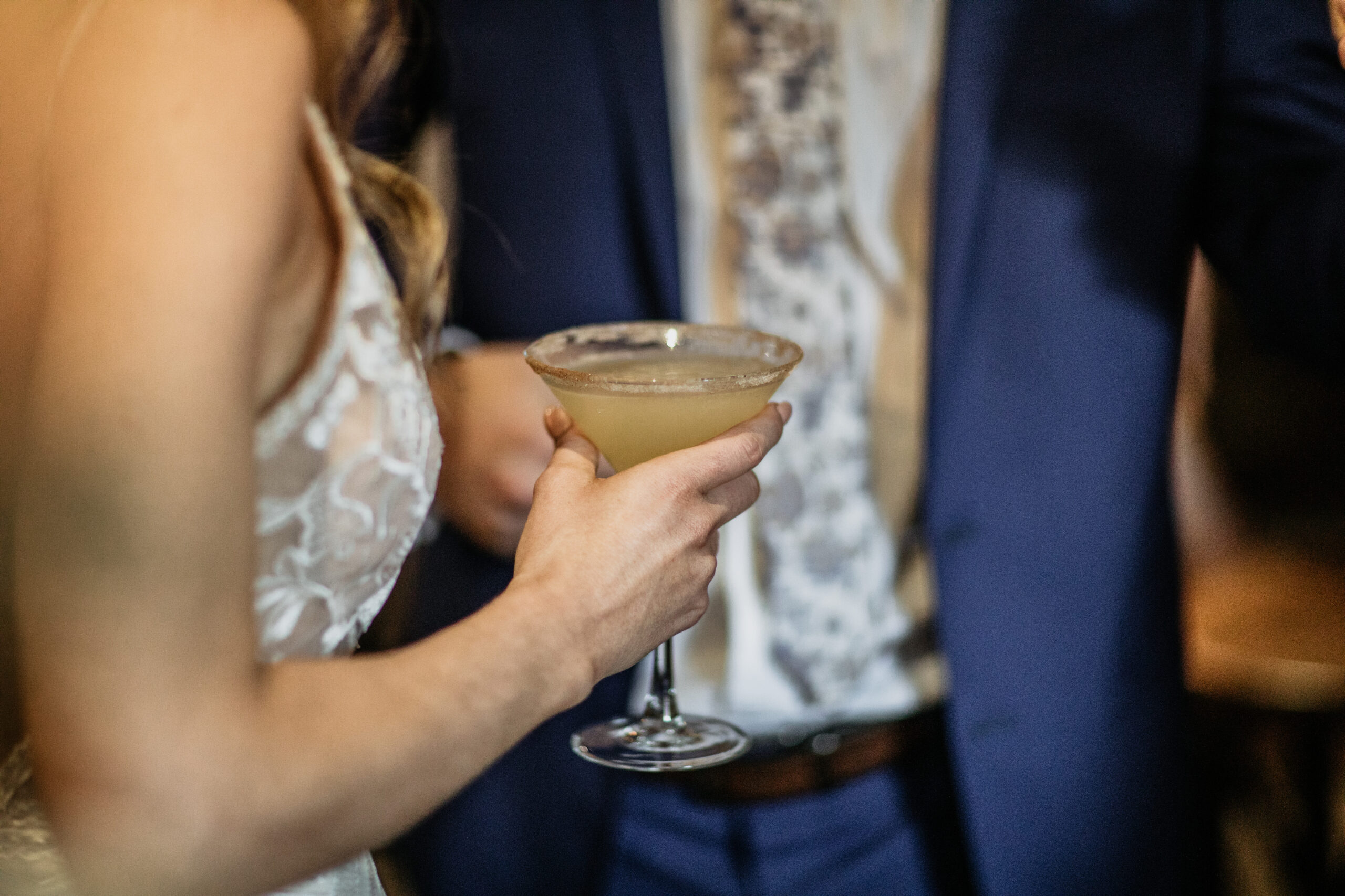 Welcome drinks served before guests move into an evening wedding reception